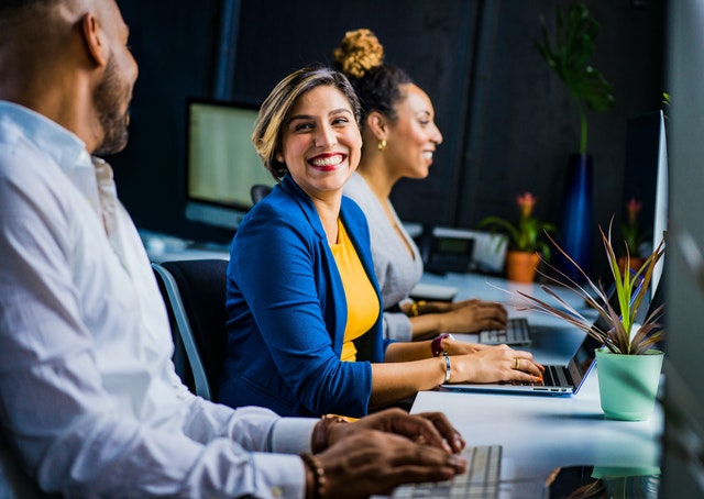 Image of a smiling woman for a blog by Metis HR on should you use an HR consultant