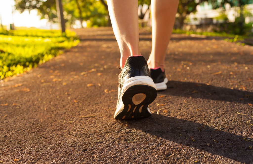 a picture of someone's feet walking away from the organisation to represent how to conduct an exit interview