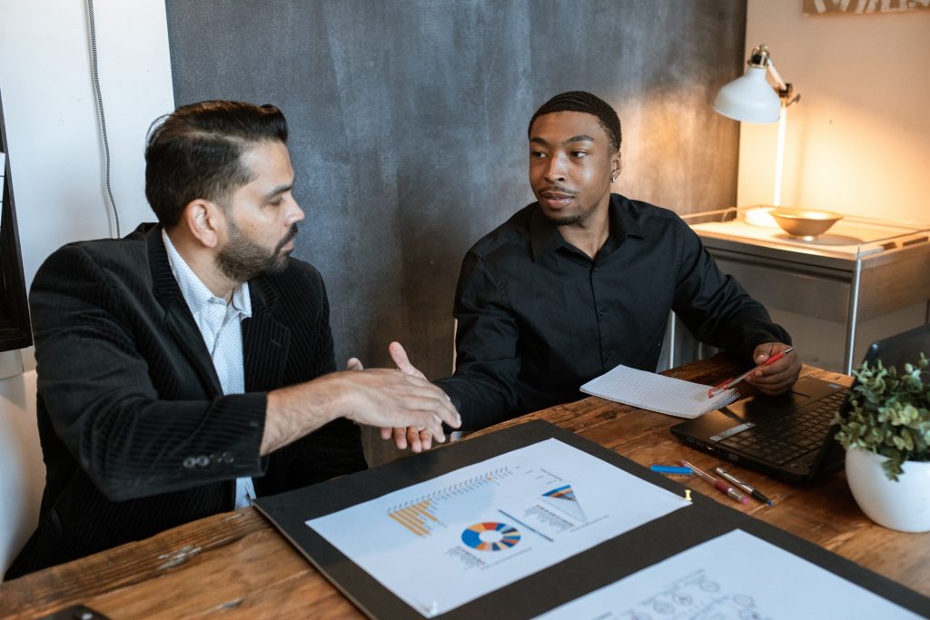 image of two men shaking hands for blog by Metis HR on getting the most out of an HR Advisor