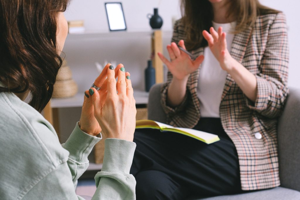 an image of two women talking